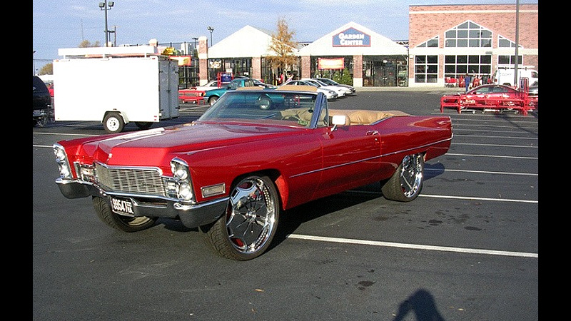 cadillac with spinners